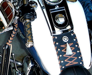 Tank bib with zippered pouch on a Softail